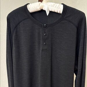 Men’s Lululemon long sleeve Henley T shirt.